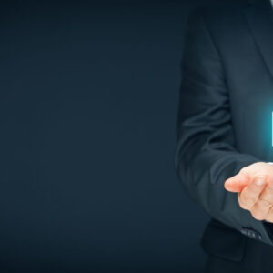 Insurance Agent with Protective Gesture and Icon
