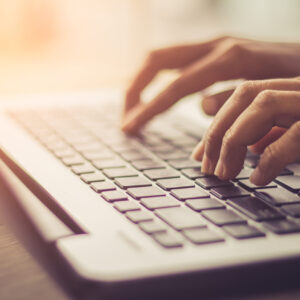 Woman Using Laptop